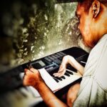 Joel writes a new song with a piano