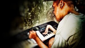 Joel writes a new song with a piano